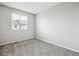 Bedroom features plush carpet and natural lighting at 1551 Northridge Dr, Highlands Ranch, CO 80126