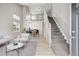Bright living room boasts an open floor plan, high ceilings, and modern decor for a welcoming atmosphere at 1551 Northridge Dr, Highlands Ranch, CO 80126