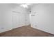 Spare bedroom with carpet and closet at 23420 E Berry Ave, Aurora, CO 80016