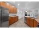 Well-equipped kitchen with stainless steel appliances, ample cabinetry, and a functional layout at 23420 E Berry Ave, Aurora, CO 80016