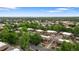 Aerial view showcasing the neighborhood's mature trees and charming townhomes at 1264 S Crystal Way, Aurora, CO 80012