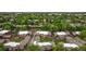 Aerial view showcasing the community surrounded by lush greenery and mature trees at 1264 S Crystal Way, Aurora, CO 80012