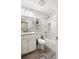 Clean, updated bathroom with a shower-tub combination and modern fixtures at 1264 S Crystal Way, Aurora, CO 80012