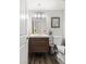 Modern bathroom features a sleek vanity, stylish lighting, and contemporary fixtures at 1264 S Crystal Way, Aurora, CO 80012