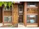 Inviting townhome with cedar siding and a well-maintained entrance at 1264 S Crystal Way, Aurora, CO 80012
