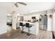 Bright kitchen with stainless steel appliances and a modern island at 1264 S Crystal Way, Aurora, CO 80012