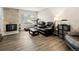 Spacious living room features hardwood floors, a fireplace, and an open layout at 1264 S Crystal Way, Aurora, CO 80012