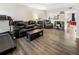 Cozy living room with hardwood floors, comfortable seating, and a bright, open feel at 1264 S Crystal Way, Aurora, CO 80012