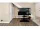 Bright and airy living room features hardwood floors, staircase, and ample natural light at 1264 S Crystal Way, Aurora, CO 80012