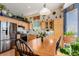Spacious kitchen with wood cabinets, stainless steel appliances, and ample countertop space at 10554 Atwood Cir, Littleton, CO 80130