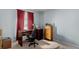 Home office with a desk, ergonomic chair, and natural light from a window at 10554 Atwood Cir, Littleton, CO 80130