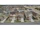 Aerial view of the neighborhood showcasing the homes and surrounding streets at 697 Sundance Cir, Erie, CO 80516