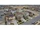 An aerial view of a neighborhood showing the arrangement of houses and streets at 697 Sundance Cir, Erie, CO 80516