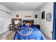 Sports themed bedroom featuring a twin bed, desk, and neutral walls at 697 Sundance Cir, Erie, CO 80516