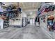 Spacious garage with storage solutions and ample room for vehicles and equipment at 697 Sundance Cir, Erie, CO 80516