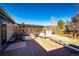 Inviting backyard deck with a hot tub, pergola, and seating, creating a perfect outdoor retreat for relaxation and entertainment at 11 Gordon Dr, Castle Rock, CO 80104