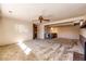 Large living area with stylish wet bar, carpeted floors, and bright recessed lighting at 11 Gordon Dr, Castle Rock, CO 80104