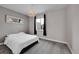 Neutral bedroom with carpet, a modern mirror, and lots of light at 3574 Corsica Way, Castle Rock, CO 80109
