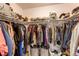 Walk-in closet featuring shelving and clothes racks for optimal organization at 4010 S Rifle Way, Aurora, CO 80013