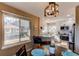 Dining area with a view into the updated kitchen at 4010 S Rifle Way, Aurora, CO 80013