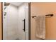 Modern shower with white subway tile, black trim, and black fixtures, offering a clean design at 4010 S Rifle Way, Aurora, CO 80013