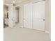 Comfortable bedroom with a closet and an easy access to the bathroom providing a functional space for relaxation at 39417 Stockton Cir, Elizabeth, CO 80107