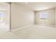 Spacious bedroom with neutral tones, carpet flooring, and a window showcasing the outside view, creating a serene ambiance at 39417 Stockton Cir, Elizabeth, CO 80107