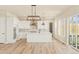 This gorgeous kitchen features ample cabinet space, an island, and stainless steel appliances at 39417 Stockton Cir, Elizabeth, CO 80107