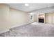 Large basement space featuring carpet and a window with natural light at 12388 Jasmine St, Brighton, CO 80602
