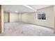 Spacious basement featuring carpet and a window offering natural light at 12388 Jasmine St, Brighton, CO 80602
