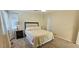 Cozy bedroom with plush carpeting and a neutral color scheme at 12388 Jasmine St, Brighton, CO 80602
