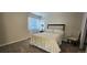 Comfortable bedroom with a neutral color scheme and soft, plush carpeting at 12388 Jasmine St, Brighton, CO 80602