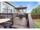 Outdoor deck area features a grill and is perfect for entertaining or relaxing with great backyard views at 12388 Jasmine St, Brighton, CO 80602