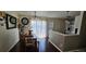 Comfortable dining space with stylish lighting and access to the kitchen at 12388 Jasmine St, Brighton, CO 80602