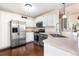 Well-equipped kitchen featuring stainless steel appliances and ample countertop space at 12388 Jasmine St, Brighton, CO 80602