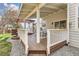 Inviting covered back deck with a cozy lounge area and outdoor dining space at 17979 E Dorado Dr, Centennial, CO 80015