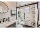 Bathroom featuring marble tiled shower with glass doors and modern fixtures in a neutral color palette at 17979 E Dorado Dr, Centennial, CO 80015