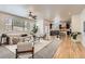 Bright and airy living room flowing into a modern kitchen, perfect for entertaining and comfortable living at 17979 E Dorado Dr, Centennial, CO 80015