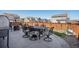 Backyard patio with metal table and chair seating at 965 Peach Leaf Ln, Elizabeth, CO 80107