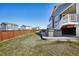 Exterior view of backyard with patio and hot tub at 965 Peach Leaf Ln, Elizabeth, CO 80107
