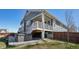 Exterior view of backyard with patio and hot tub at 965 Peach Leaf Ln, Elizabeth, CO 80107