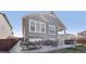 Back of house with patio area and outdoor furniture at 965 Peach Leaf Ln, Elizabeth, CO 80107