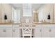 Elegant bathroom with granite countertops, dual sinks, and modern fixtures at 965 Peach Leaf Ln, Elizabeth, CO 80107