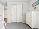 Well-organized bedroom with closet, providing ample storage space at 965 Peach Leaf Ln, Elizabeth, CO 80107