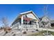 Quaint house with an American flag on the front porch, complemented by a well-kept lawn at 965 Peach Leaf Ln, Elizabeth, CO 80107