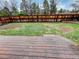 Fenced backyard viewed from the wooden deck, offering a private outdoor space at 5521 Spruce Ave, Castle Rock, CO 80104