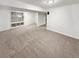 Finished basement area with built in shelving, closet and recessed lighting, offers versatile living space at 5521 Spruce Ave, Castle Rock, CO 80104