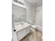 Bathroom featuring a combined tub and shower and nice vanity at 5521 Spruce Ave, Castle Rock, CO 80104