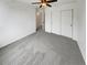 Carpeted bedroom featuring a ceiling fan and closet at 5521 Spruce Ave, Castle Rock, CO 80104