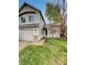 Charming two-story home featuring a well-maintained lawn and an attached two-car garage at 5521 Spruce Ave, Castle Rock, CO 80104